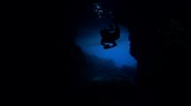 Native Free Diver Ascends To Boat From Cave