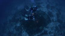 Divers Swim Above Signs Of Destructive Fishing On Coral Reef