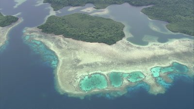Circling shallow reef around coastline