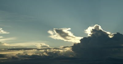 Pan across the sky at bigger cloud.