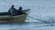 Bristol Bay Salmon Fishery - Fishermen Pull Away From Net And Take Fish To Tender