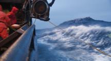 Crab Fishing Bering Sea Alaska - Fisherman Throws Hook And Runs Bouys Through Block
