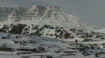 Snowy Arctic Landscape With Rugged Mountains