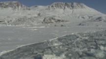 View From Boat Traveling Through Melt Ice, Tilt To Shoreline