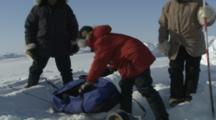 Scientists Take Measurements In The Ice