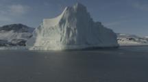 View Of Arctic Shoreline And Iceberg From Boat