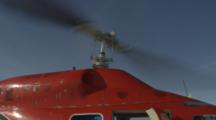 Spinning Helicopter Rotor, Tilt To Disembarking Passenger