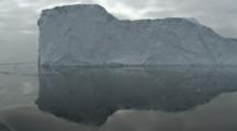 Travel Around Large Iceberg With Reflection, Steep Edge
