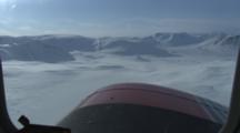 Aerial From Helicopter Over Rugged Greenland Arctic Landscape