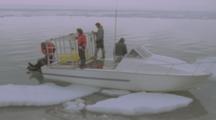 People Prepare Walrus Filming Cage On Boat