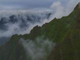 Aerial Over Jagged Hawaiian Mountains With Fog