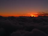 Aerial Flying Over Top Of Clouds At Sunset