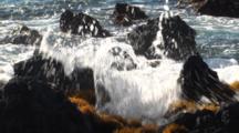 Waves Wash Up On Rocky Shore