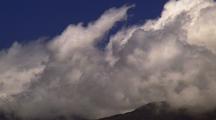 Timelapse Of Rolling Clouds Over Hilltops