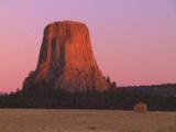 Time Lapse Devil's Tower Rock Formation Lit By Sunrise