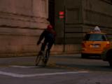 Bike Messenger Rides Bicycle Down A Busy New York Street
