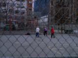 Kids Play On A Basketball Court
