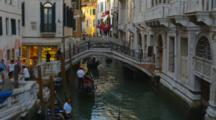 Small Bridge Over Canal With Gondolas