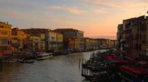 Motorboats And Gondolas On The Grand Canal At Sunset