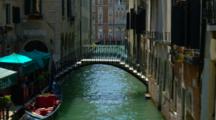 Bridge, Gondolas, And Boats On Venice Canal