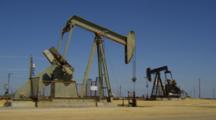 Oil Pumpjacks Bob Up and Down, Central California   
