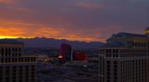 Las Vegas, Buildings With Vivid Sunrise Or Sunset Sky Behind