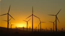 Wind Turbines At Sunset
