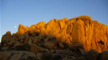 Boulders In Sunset Golden Light And Full Moon