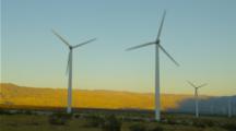 Wind Turbines Near Palm Springs At Sunset