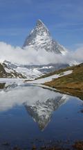 Vertical Time Lapse Matterhorn Reflected In Lake, Switzerland