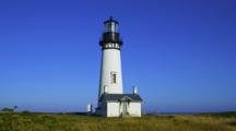 Lighthouse On Rugged Coast