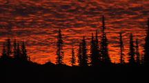 Bright Red Sunrise At Reflection Lake   