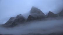 Mountain Peaks In Fog, Auyuittuq National Park, Baffin Island