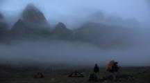 Hiking To Camp And Mountain Peaks In Fog, Auyuittuq National Park, Baffin Island