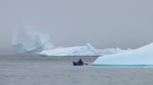 Canoeing Close To Iceberg, Near Qikitarjuaq, Baffin Island