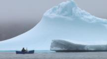 Artist Painting Iceberg From Canoe, Near Qikitarjuaq, Baffin Island