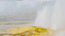 Clepsydra Geyser Erupts In The Lower Geyser Basin In Yellowstone National Park, Wyoming, USA