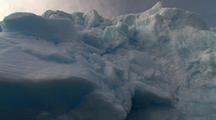 Traveling Up close detail of Blue Antarctic Glacier Iceberg