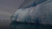 Traveling Up close detail of Blue Antarctic Glacier Iceberg