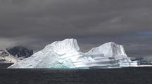 Antarctic Icebergs With Mountains Behind