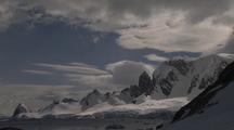 Timelapse Clouds Over Antarctic Mountainous Shoreline