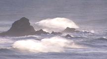 Waves Crashing Into Rocky Island