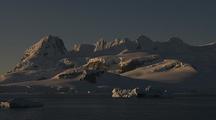 Antarctic Scenic Shoreline With Mountains From Boat Pov