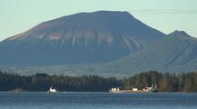 Ocean Tug Pulling A Barge. Mt. Edgecumbe Volcano In Background.