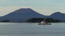 Coast Guard Patrol Boat In Sitka Sound. Mt. Edgecumbe Volcano In The Background.