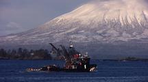 Fishing Boat: Seiner Passes By A Volcano