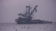 Commercial Fishing Boat  In A Snow Storm