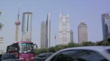 Traffic On Century Avenue With Hi Rise Buildings Of Financial District Lujiazui