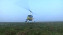 Reveal Of R44 Helicopter With Cineflex Camera Mount Approach To Landing On Grassy Arctic Tundra, Dusk Dawn Sky, Western Arctic Caribou Herd Npra National Petroleum Reserve Shot In Hd In Alaska Arctic 