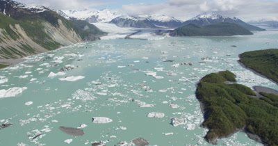 UHD aerial of Alaska lake and glacier in Glacier national Park